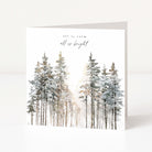 A square Christmas greeting card standing upright on a white surface, featuring a watercolor winter forest with snow-covered pine trees and the words 'all is calm all is bright' at the top.