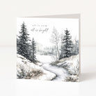 A square Christmas greeting card with a winter landscape illustration, featuring snow-covered trees and a winding stream with the words 'all is calm all is bright' printed at the top. The card is shown standing upright against a clean white background.