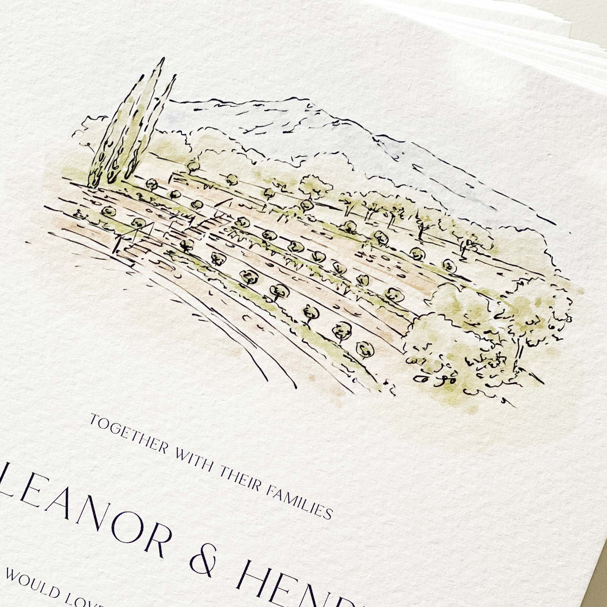 A close-up of a printed invitation card featuring a delicate hand-drawn landscape illustration in black ink and soft olive-green watercolor on textured white paper. The text includes 'TOGETHER WITH THEIR FAMILIES' and part of a personalised name.