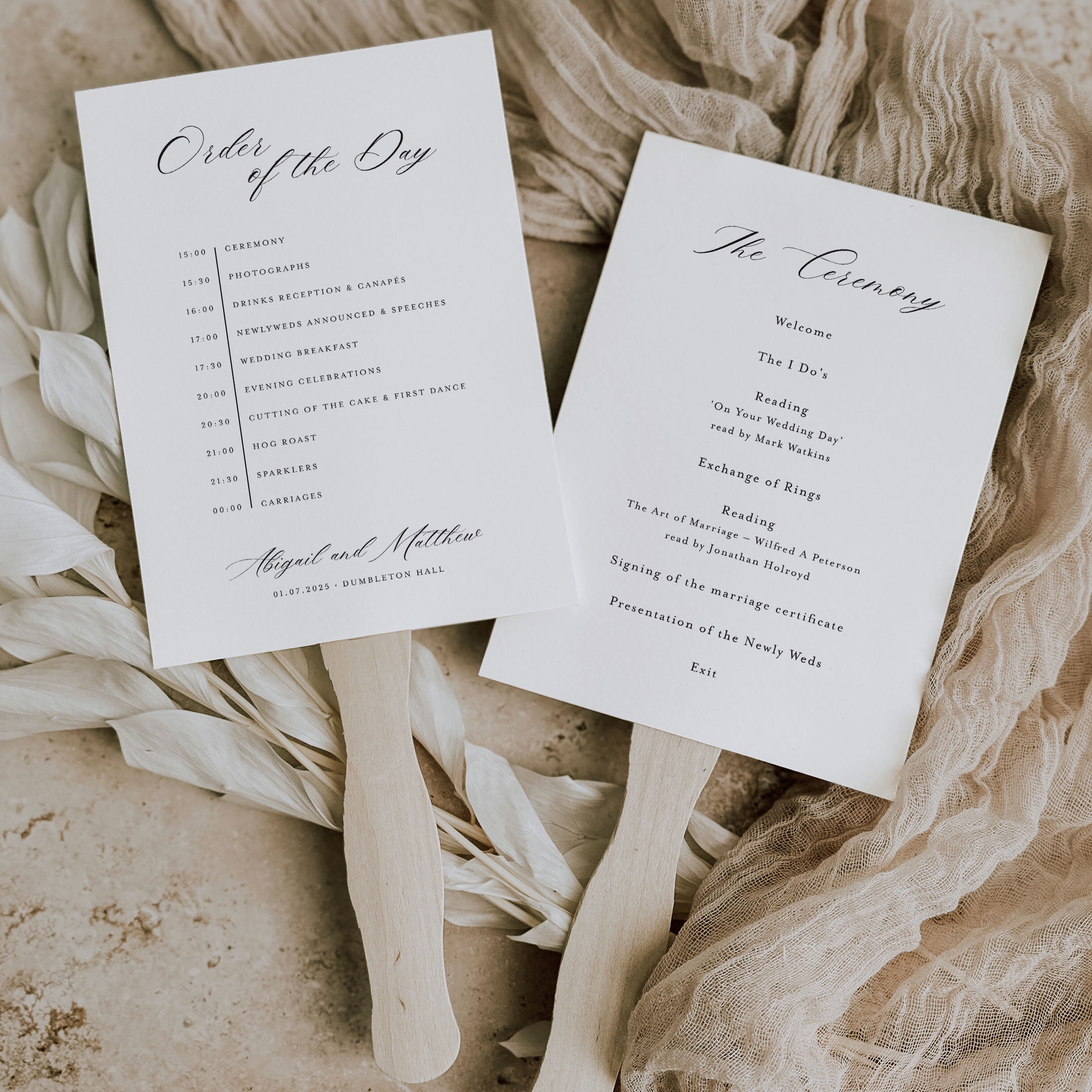 calligraphy wedding programme paddle fan with wooden handle on a neutral background