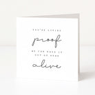 Motivational card with text 'You're living proof we can make it out of here alive' on a white background