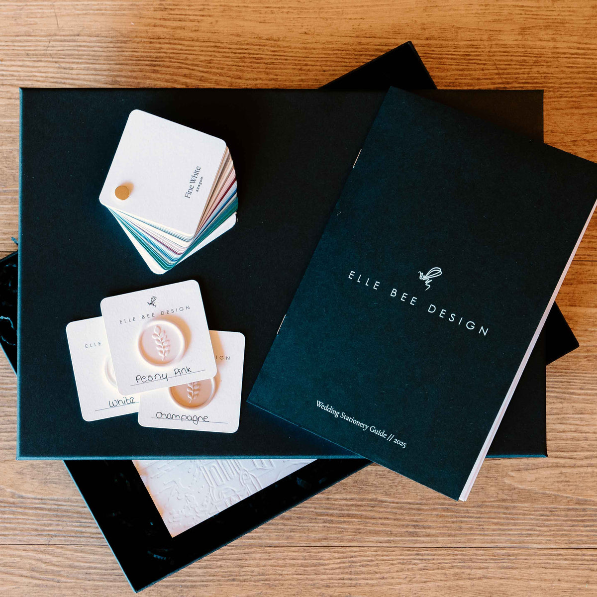 ELLE BEE DESIGN product packaging on a wooden surface