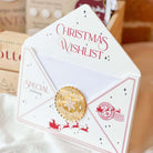Christmas-themed card with 'Christmas Wishlist' text and decorative elements.