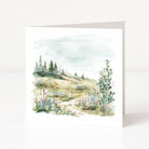 Greeting card with a scenic illustration of a forest and mountains on a white background