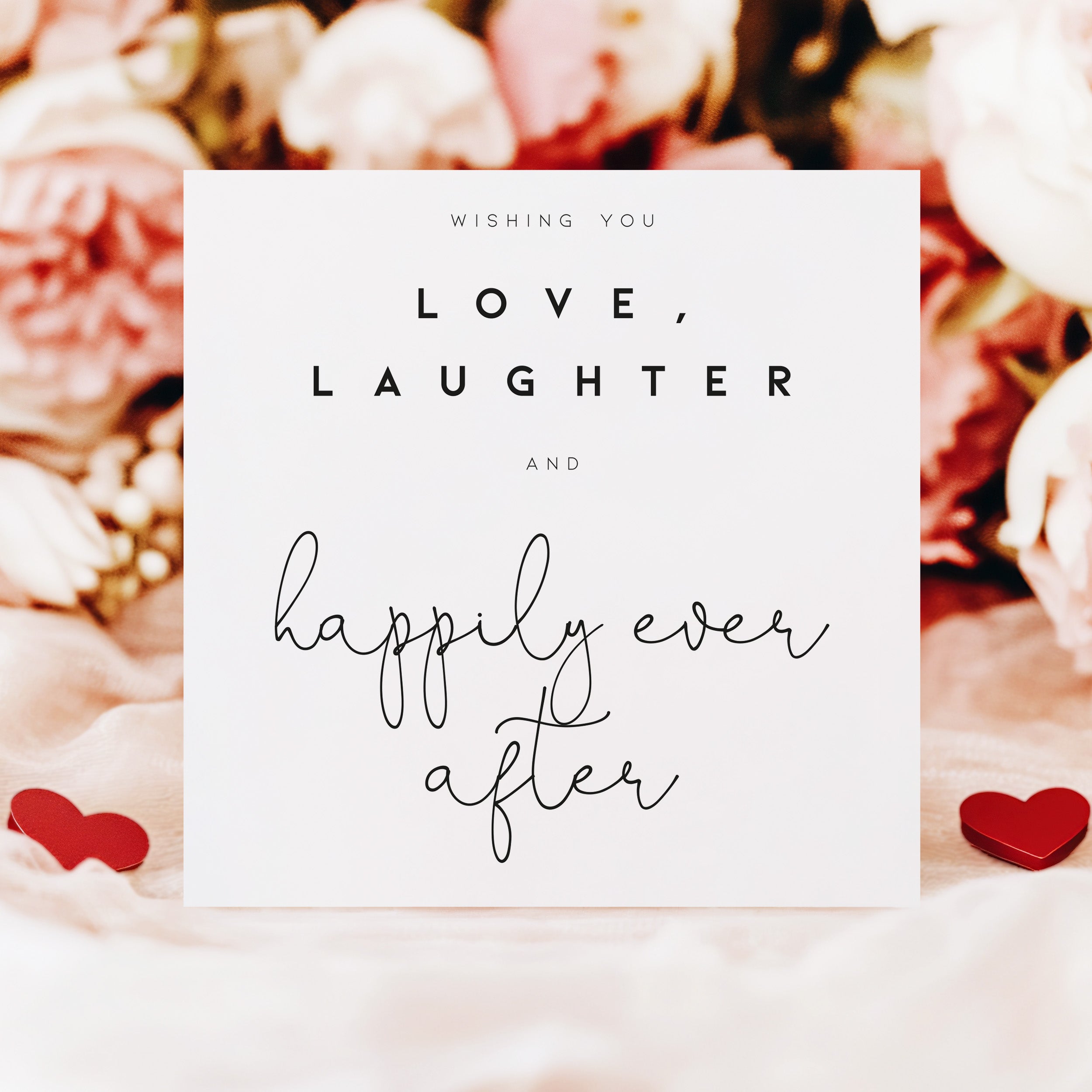 Card with 'Wishing you love, laughter and happily ever after' text on a floral background.