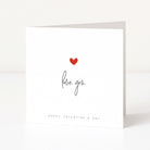 Valentine's Day card with a red heart and 'love you' text on a white background