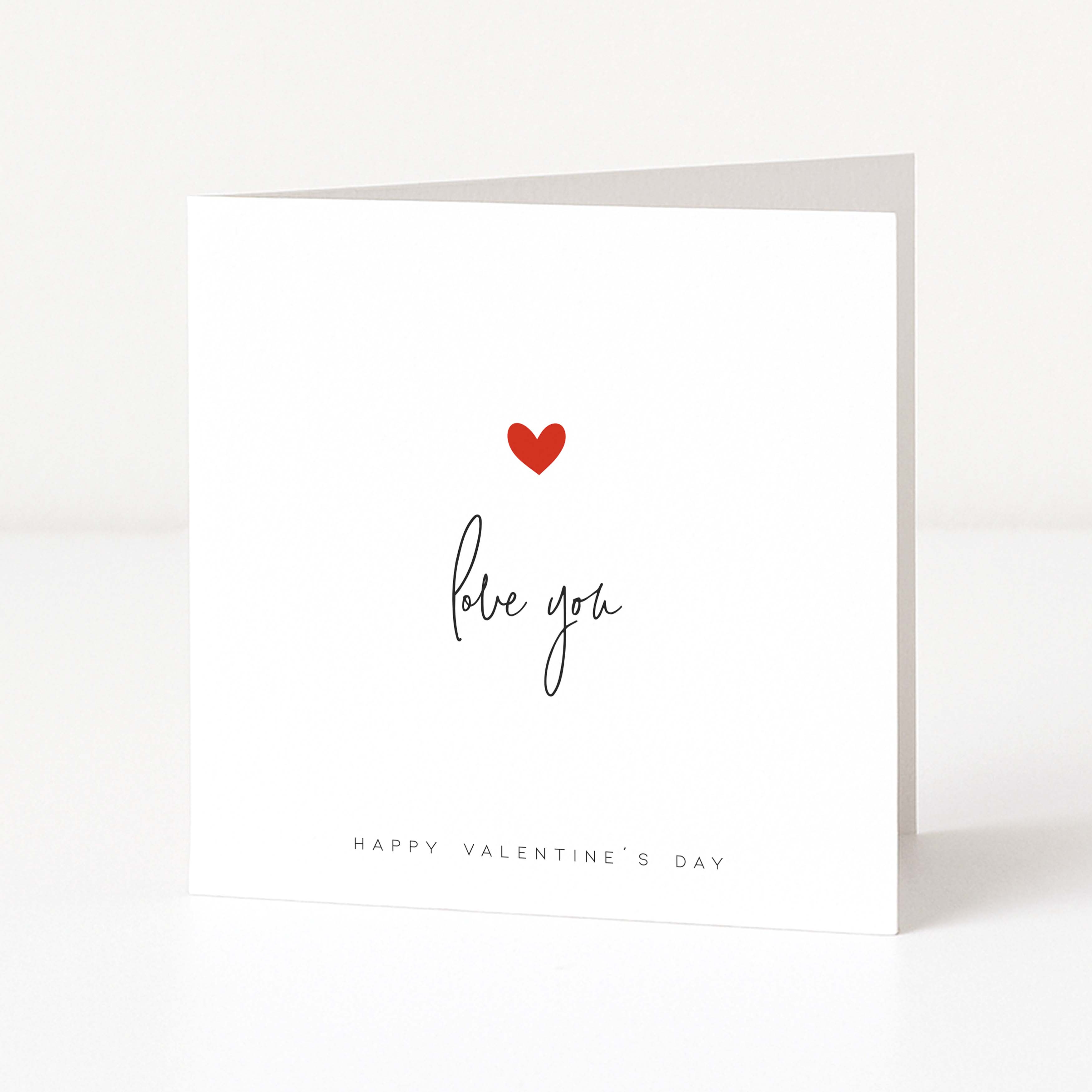 Valentine's Day card with a red heart and 'love you' text on a white background