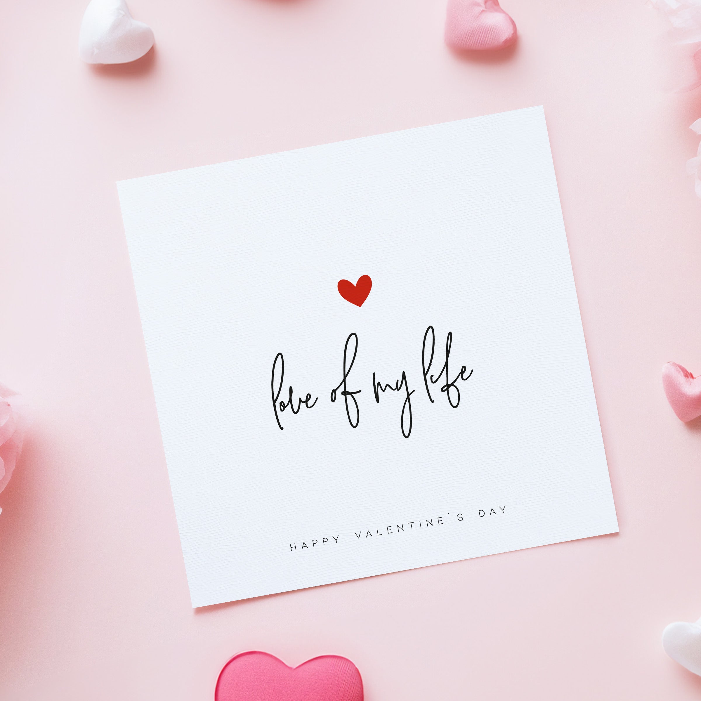 Valentine's Day card with 'Love of my life' text on a pink background