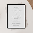 Wedding save the date in digital format on a white surface with a beige fabric background