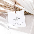 White card with initials 'J' & 'P' and text 'Thank you for sharing our special day' on a neutral background.