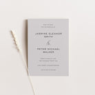 Wedding save the date card with text on a light grey background