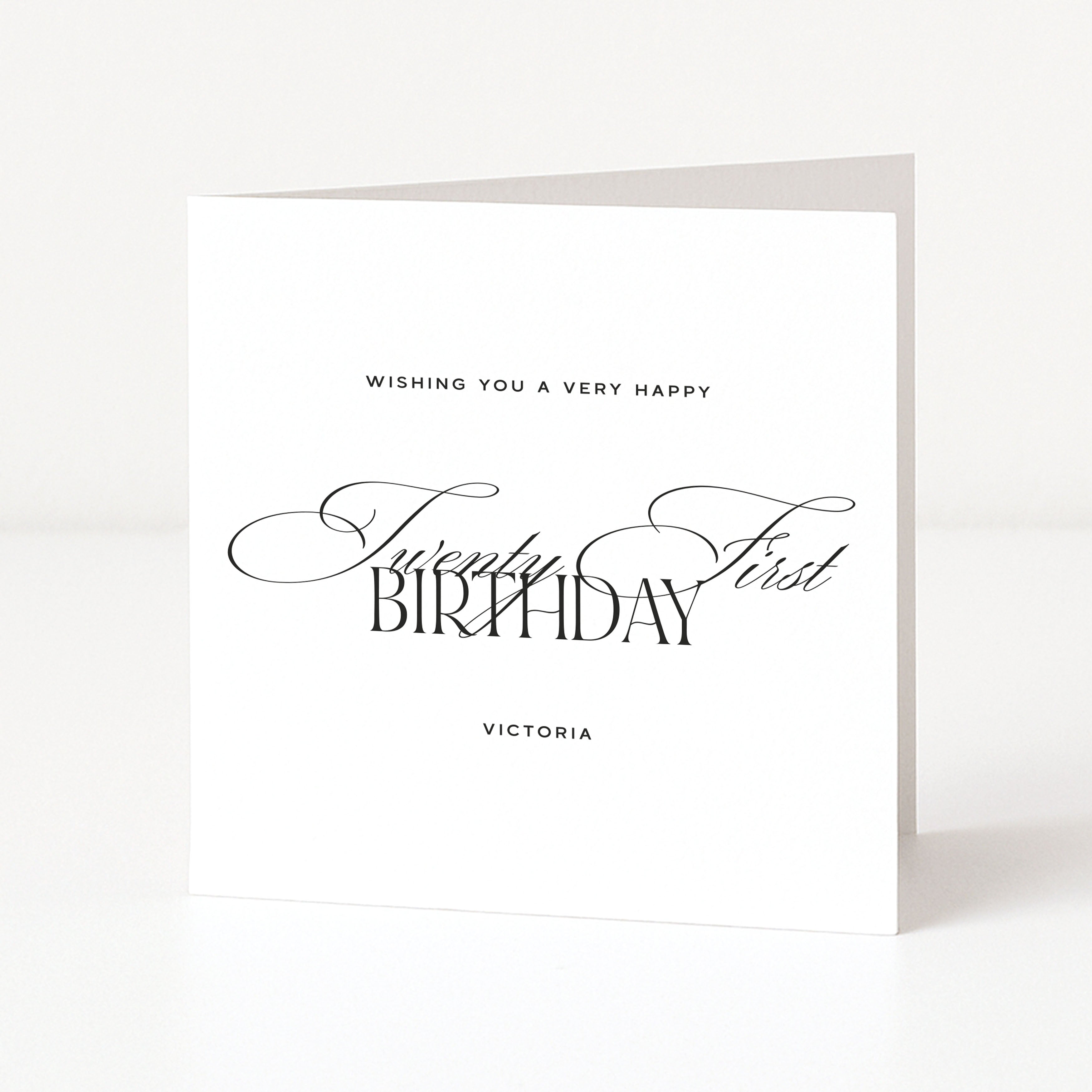 Greeting card with 'Wishing you a very happy Twenty First Birthday Victoria' text on a white background