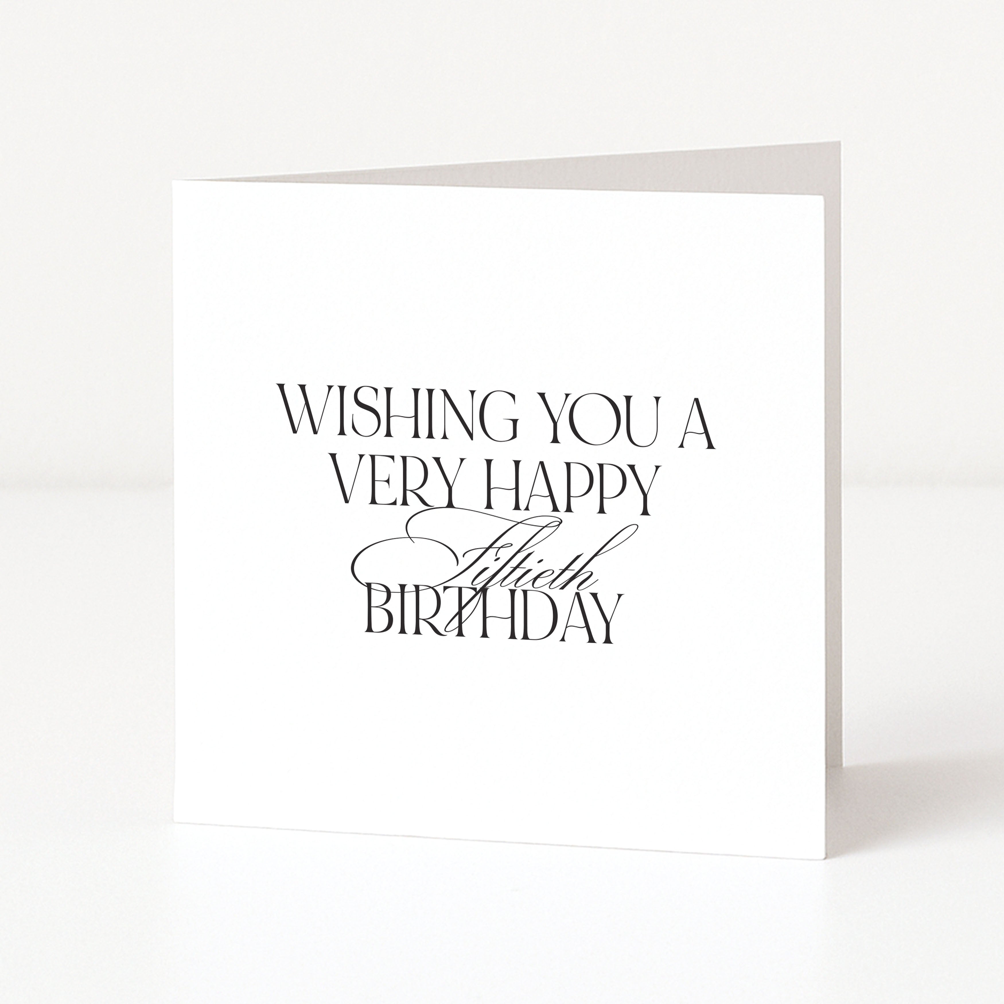 Modern square 50th birthday card featuring elegant minimalist black typography with serif and script text on a clean white background.