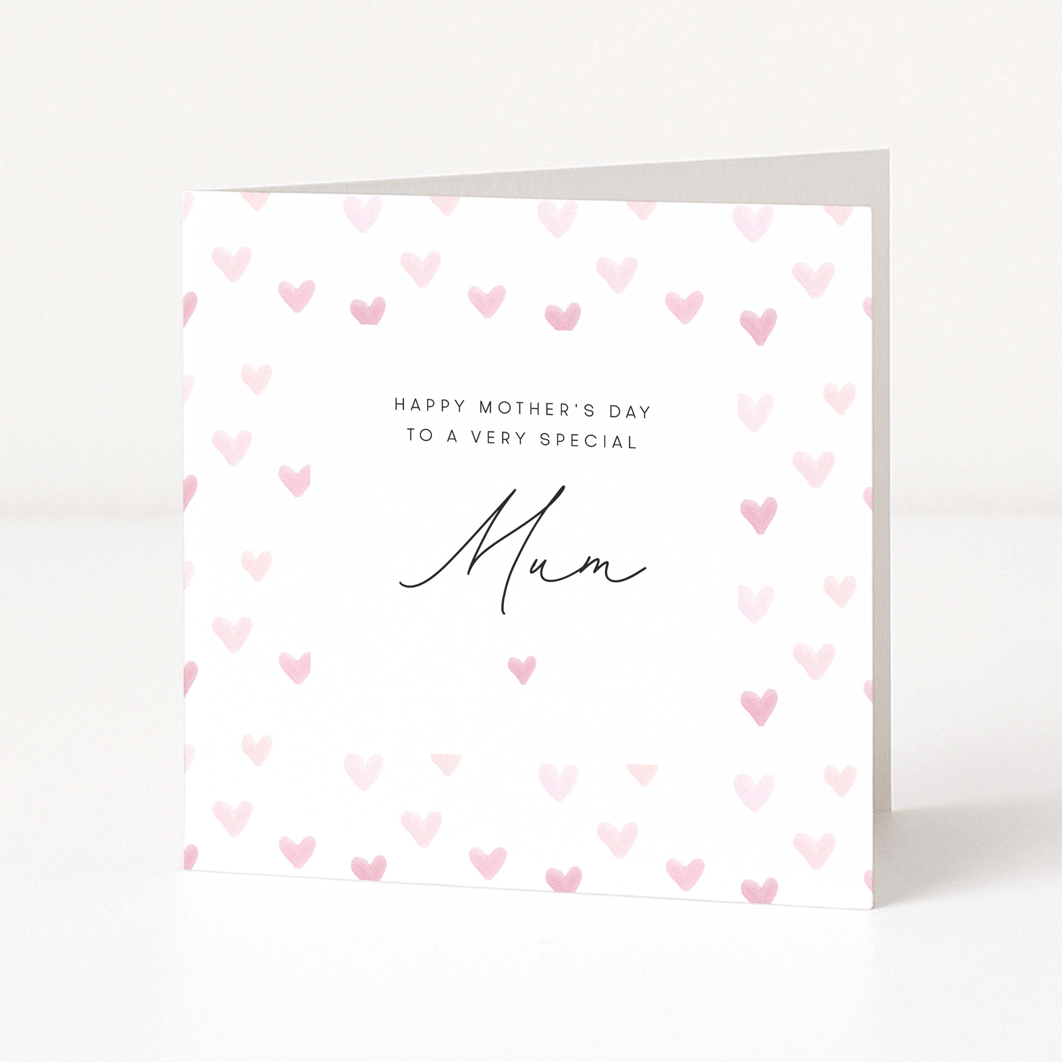 Greeting card with pink heart pattern and 'Happy Mother's Day to a very special Mum' text on a white background.