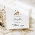 Greeting card with deer illustration and text on a decorative background