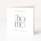 Greeting card with 'Congratulations Now Home' text on a white background