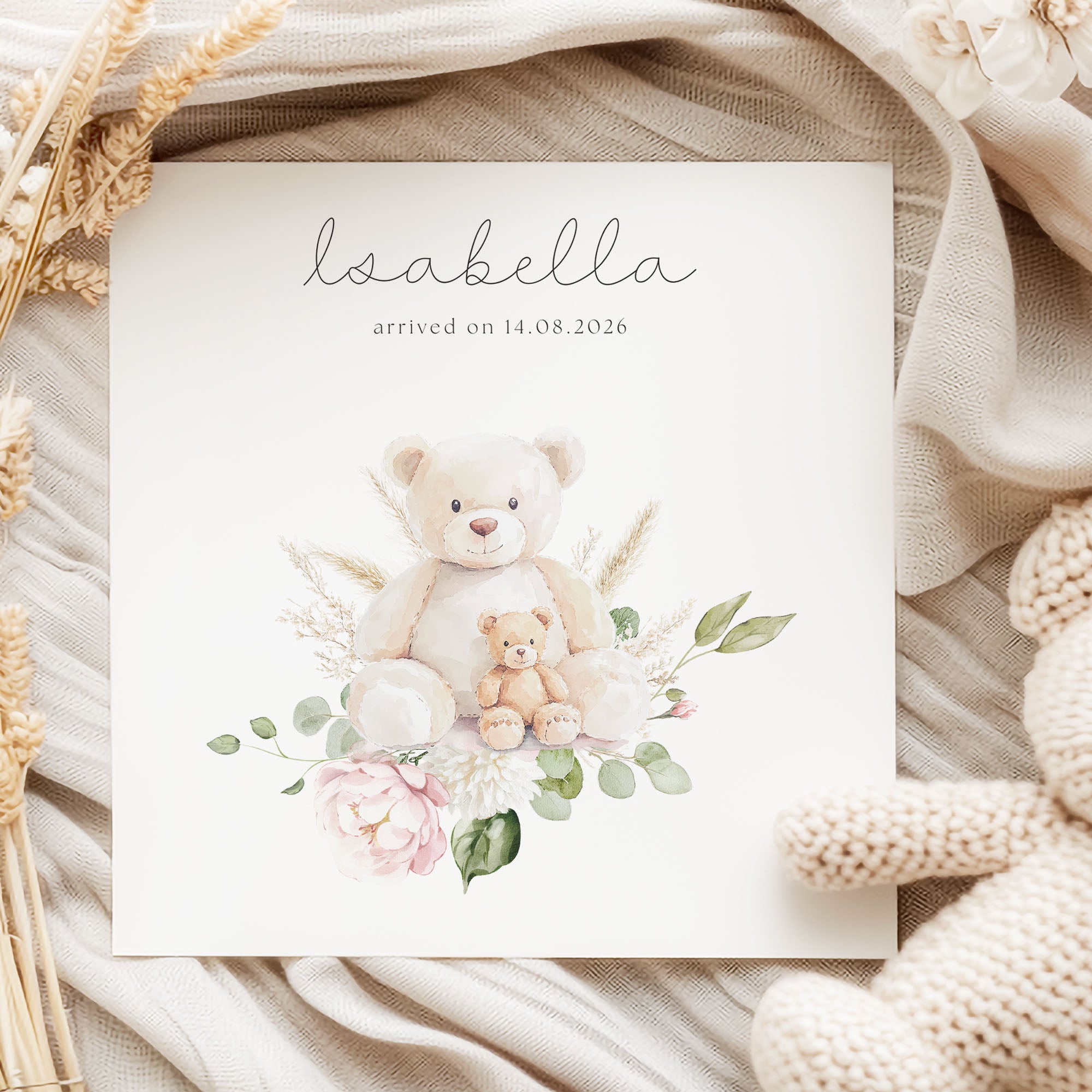 new baby card on fabric with teddy bear and dried flowers