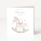 Newborn Baby Girl Personalised Card with rocking horse on white background