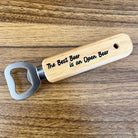 the best been in an open beer printed on wooden bottle opener. 