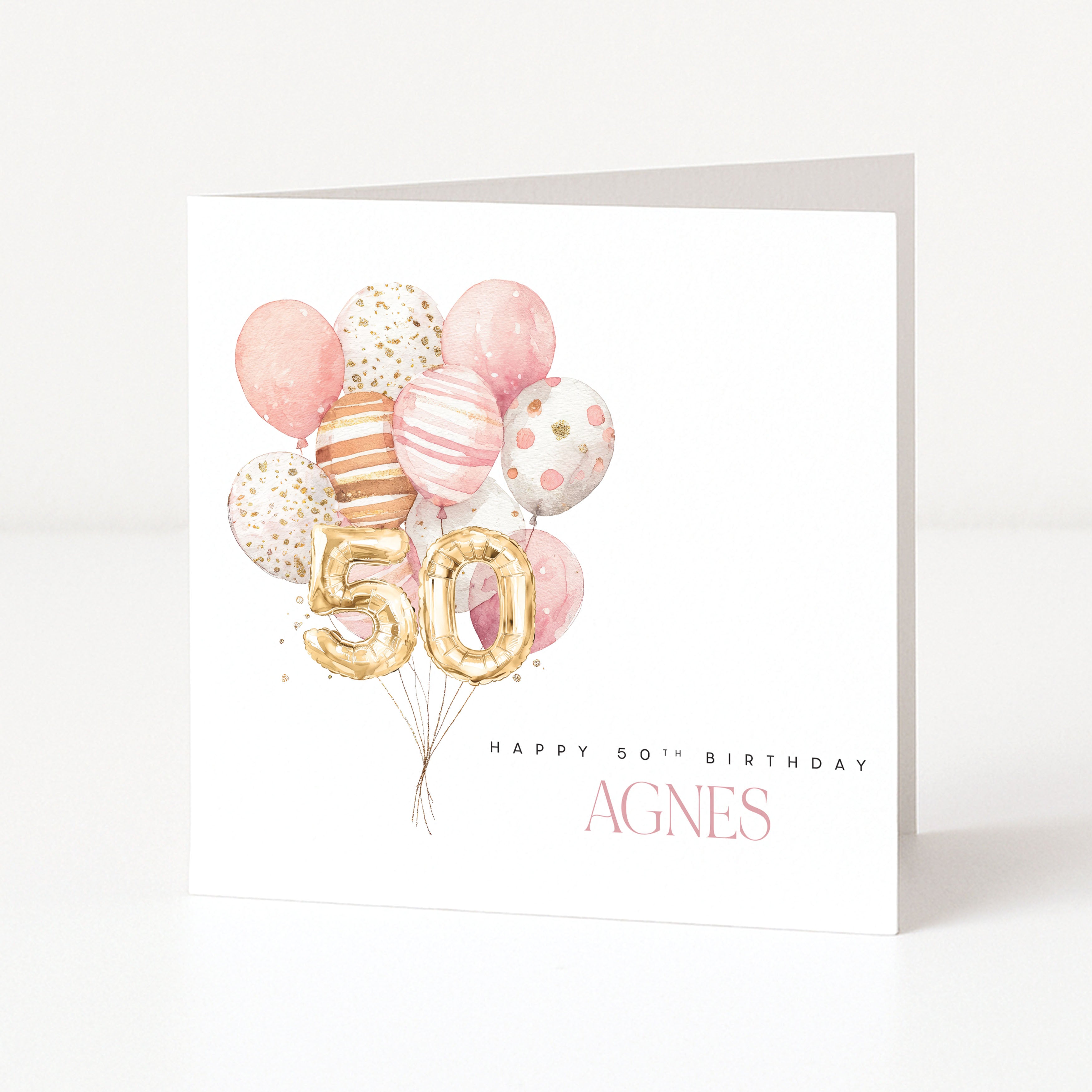 Personalised square 50th birthday card for her featuring a pink watercolour balloon bouquet cluster topped with gold foil balloon numbers fifty, and customisable front name text.