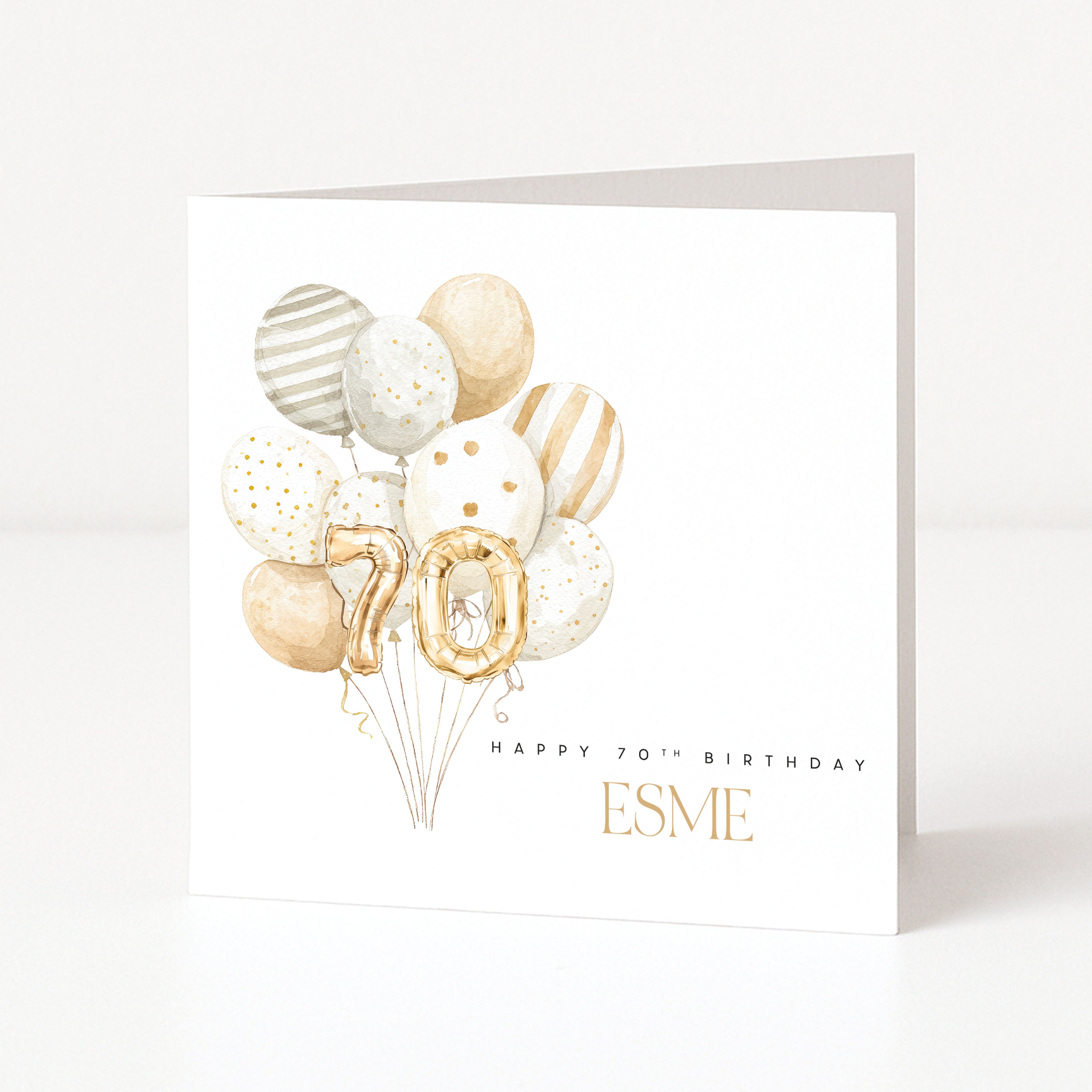 Personalised 70th birthday card for Esme with gold number balloons and a soft neutral balloon arrangement.