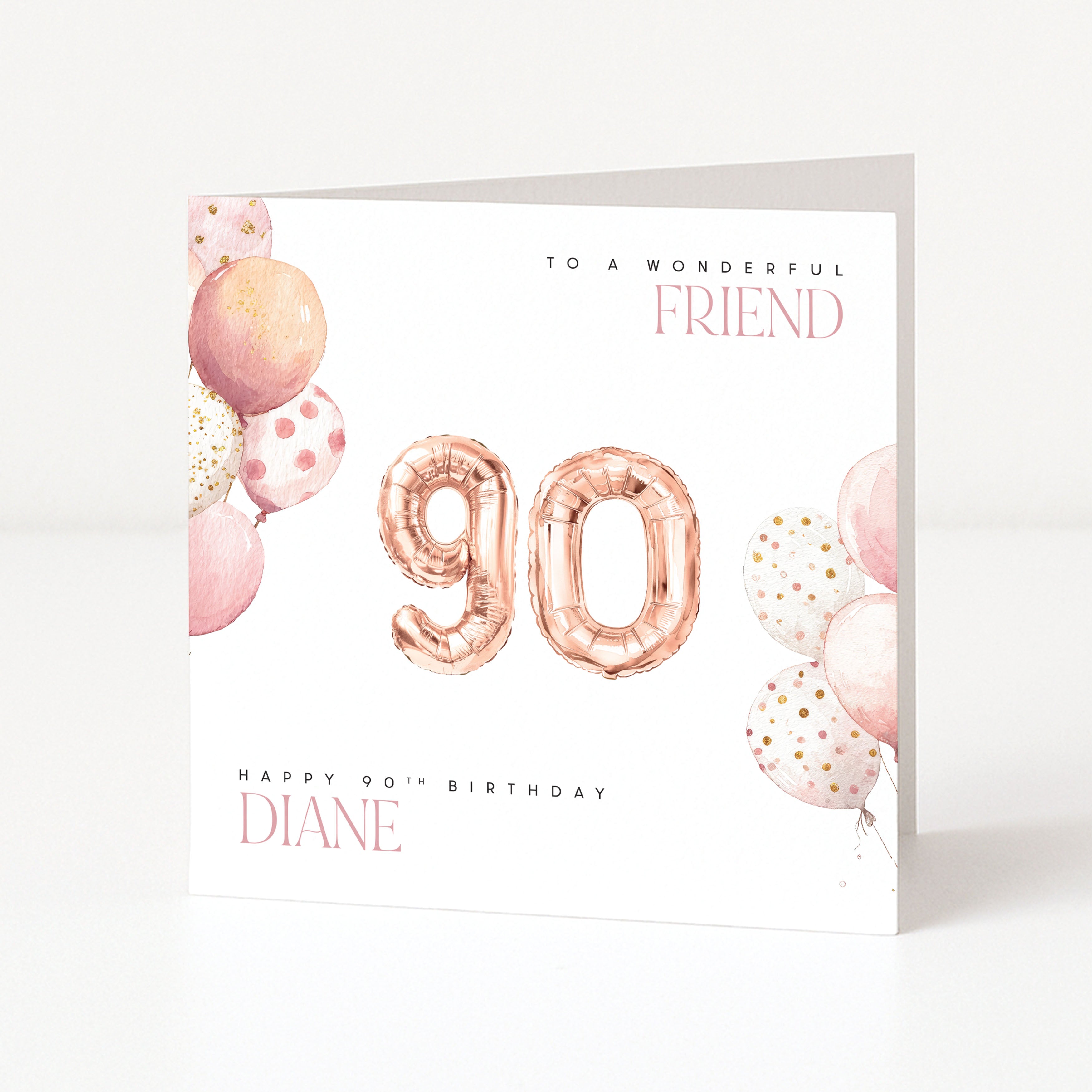 Personalised 90th birthday card for a friend with rose gold 90, pink watercolour balloons and name Diane