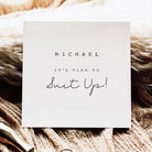 White card with text 'MICHAEL IT'S TIME TO Suit Up!' on a textured brown surface