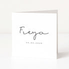 White greeting card with 'Freya' and a date printed on it against a white background