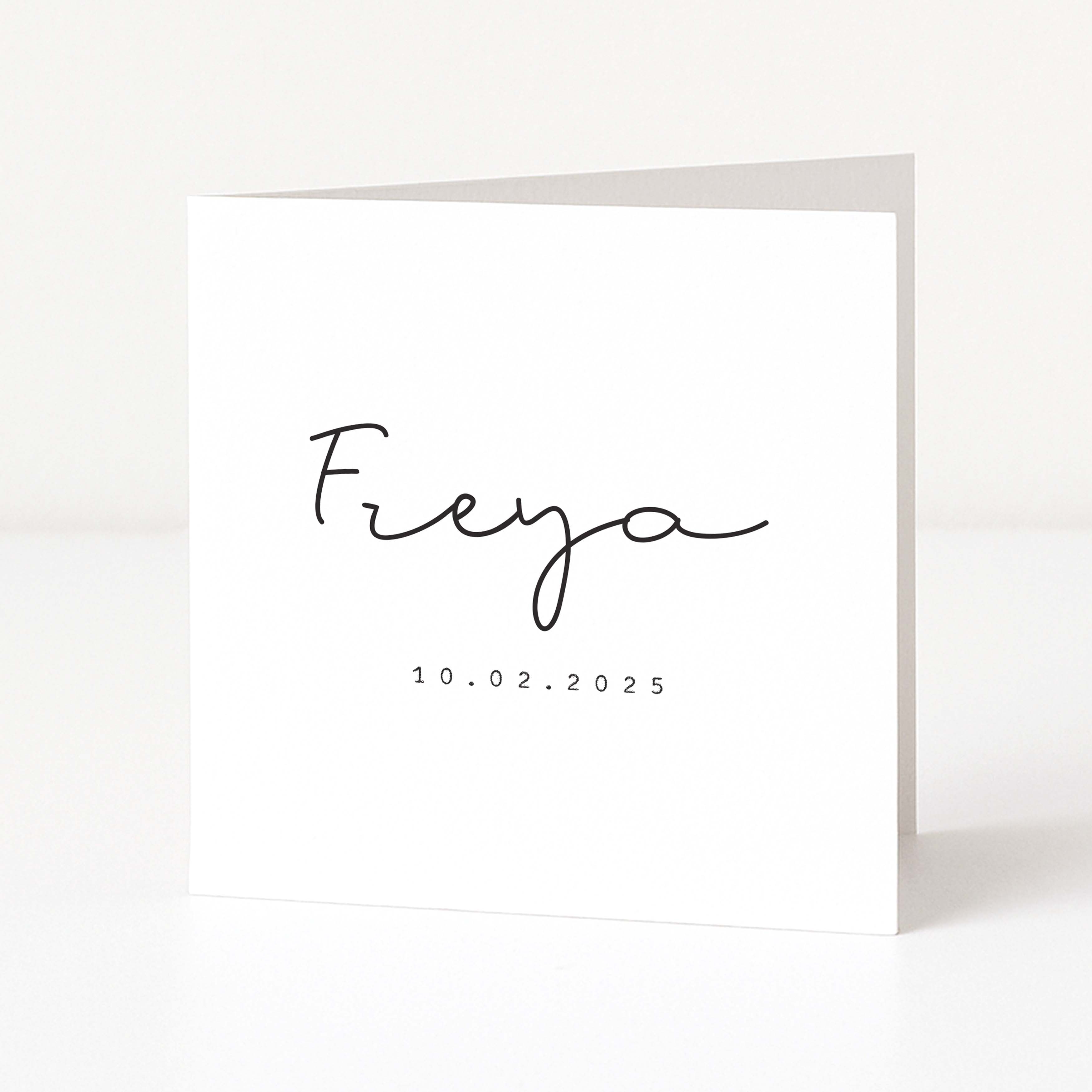 White greeting card with 'Freya' and a date printed on it against a white background