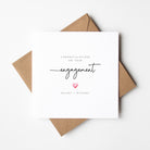 Engagement card with a heart and personalized names on a white background