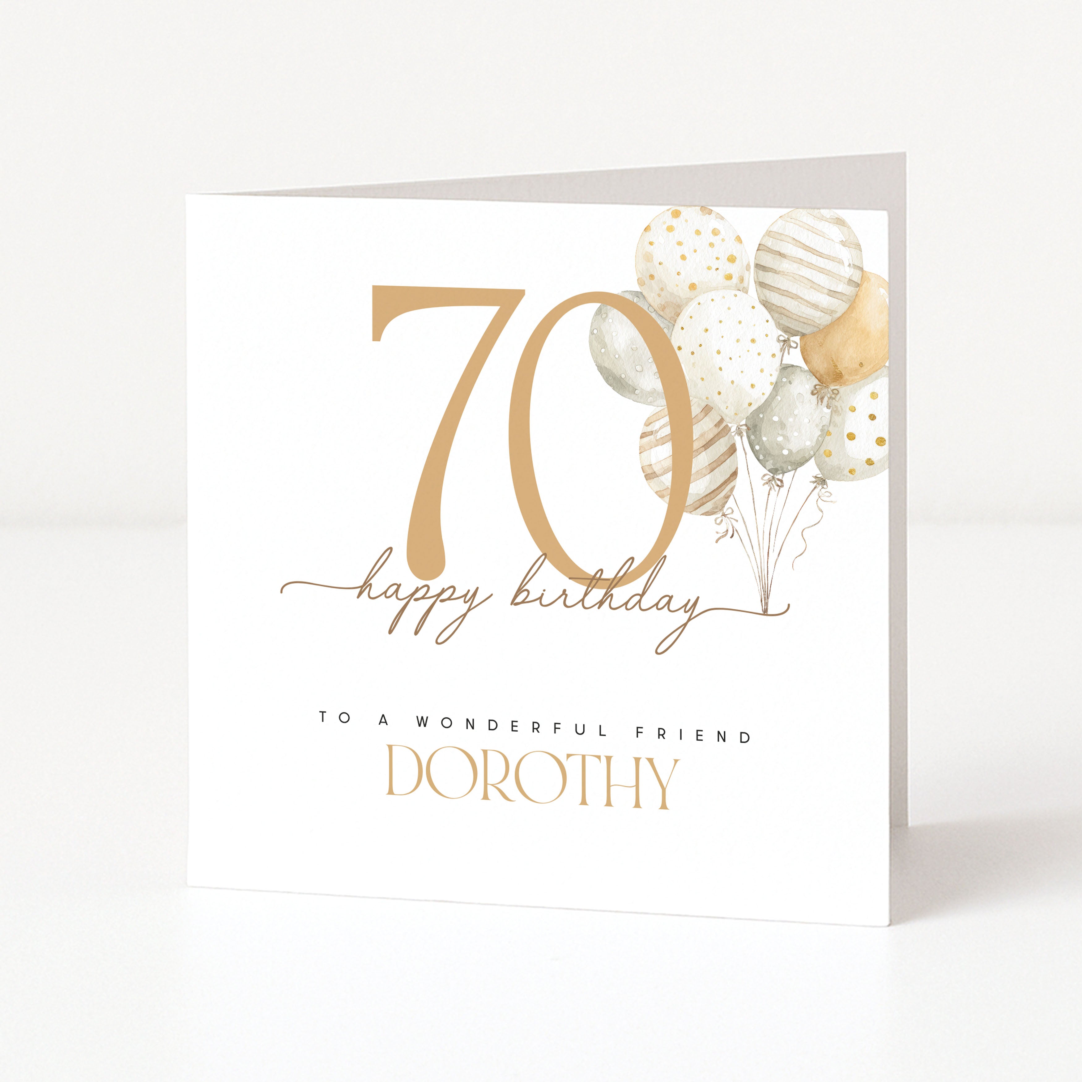 Personalised 70th birthday card for a friend with a large gold 70, neutral balloons and the name Dorothy.