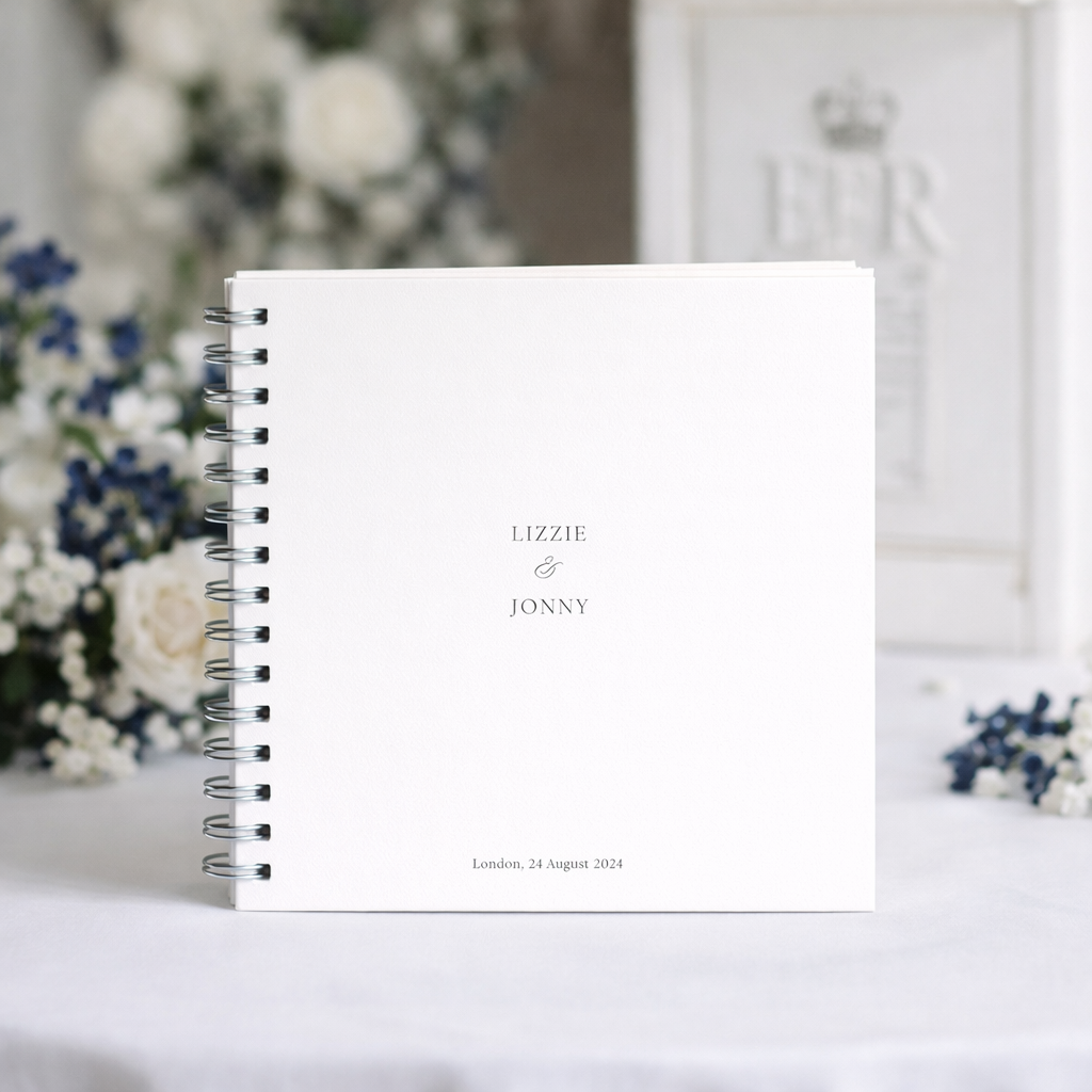 Personalised GuestBook with 'Lizzie & Jonny' on a blurred floral background