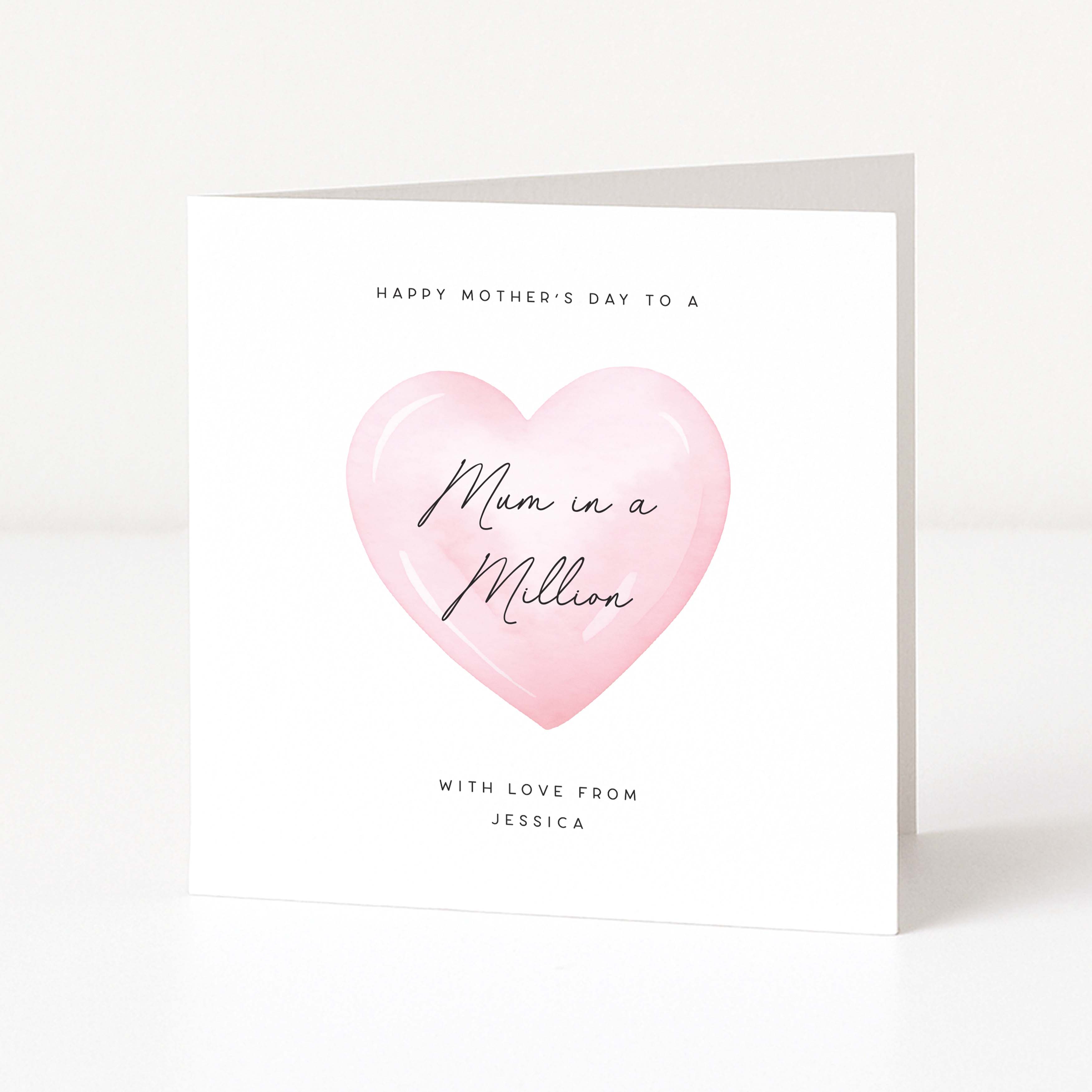 Greeting card with pink heart and text on a white background
