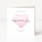 Greeting card with pink heart and 'Happy Mother's Day' text on a white background
