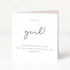 Greeting card with 'It's a girl!' text on a white background