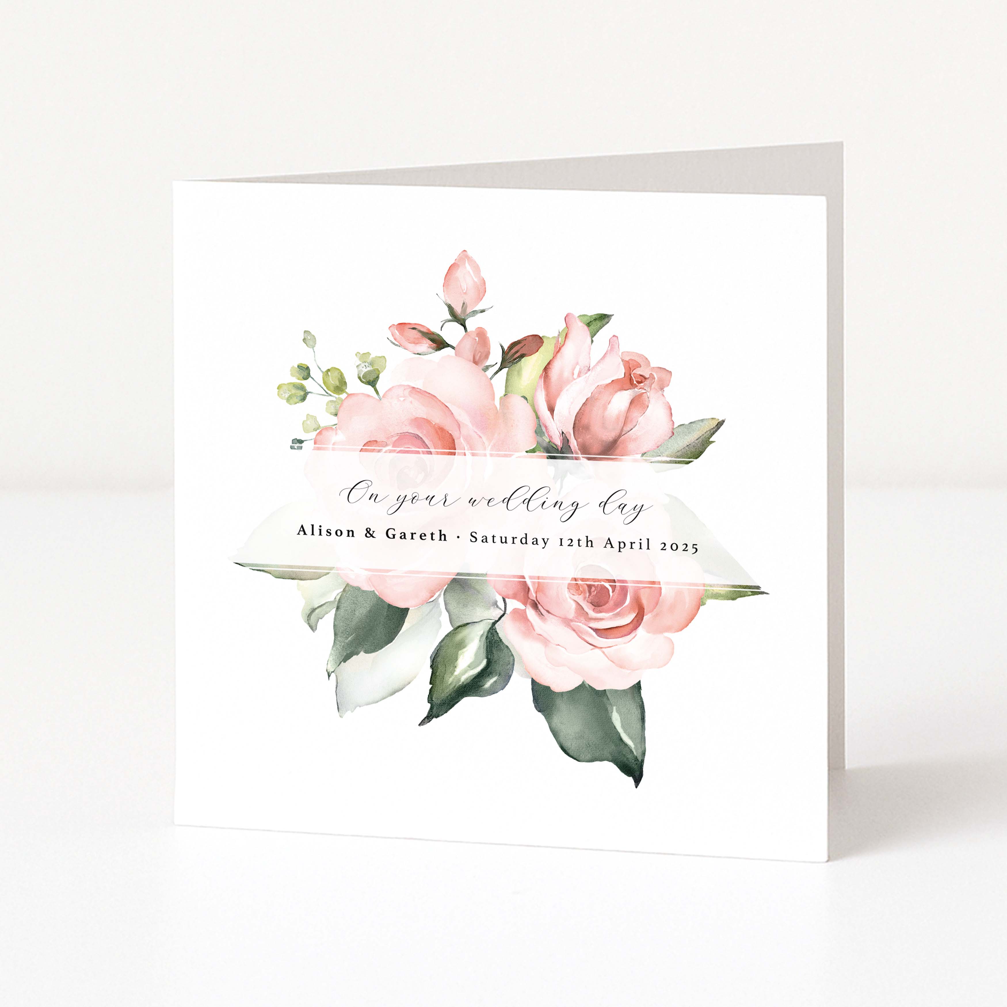 Wedding invitation card with pink roses and greenery on a white background