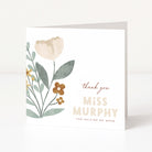 Greeting card with floral design and text on a white background