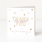 Greeting card with 'Thank You' text and decorative elements on a white background