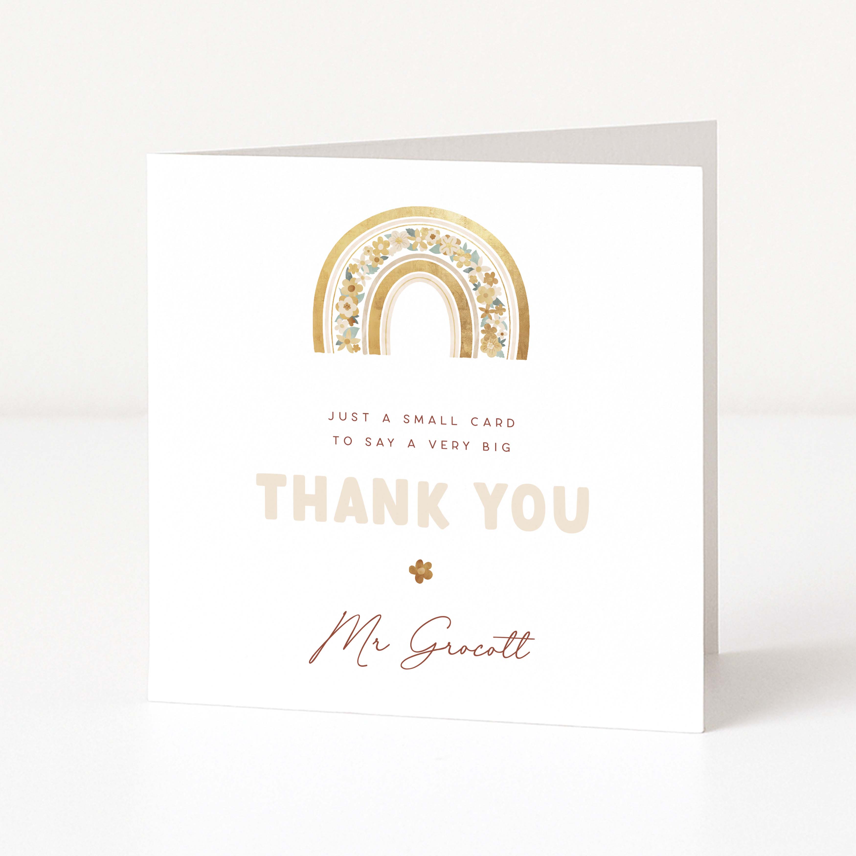 Greeting card with gold rainbow design and 'Thank You' text on a white background