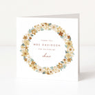 Greeting card with floral design and text on a white background