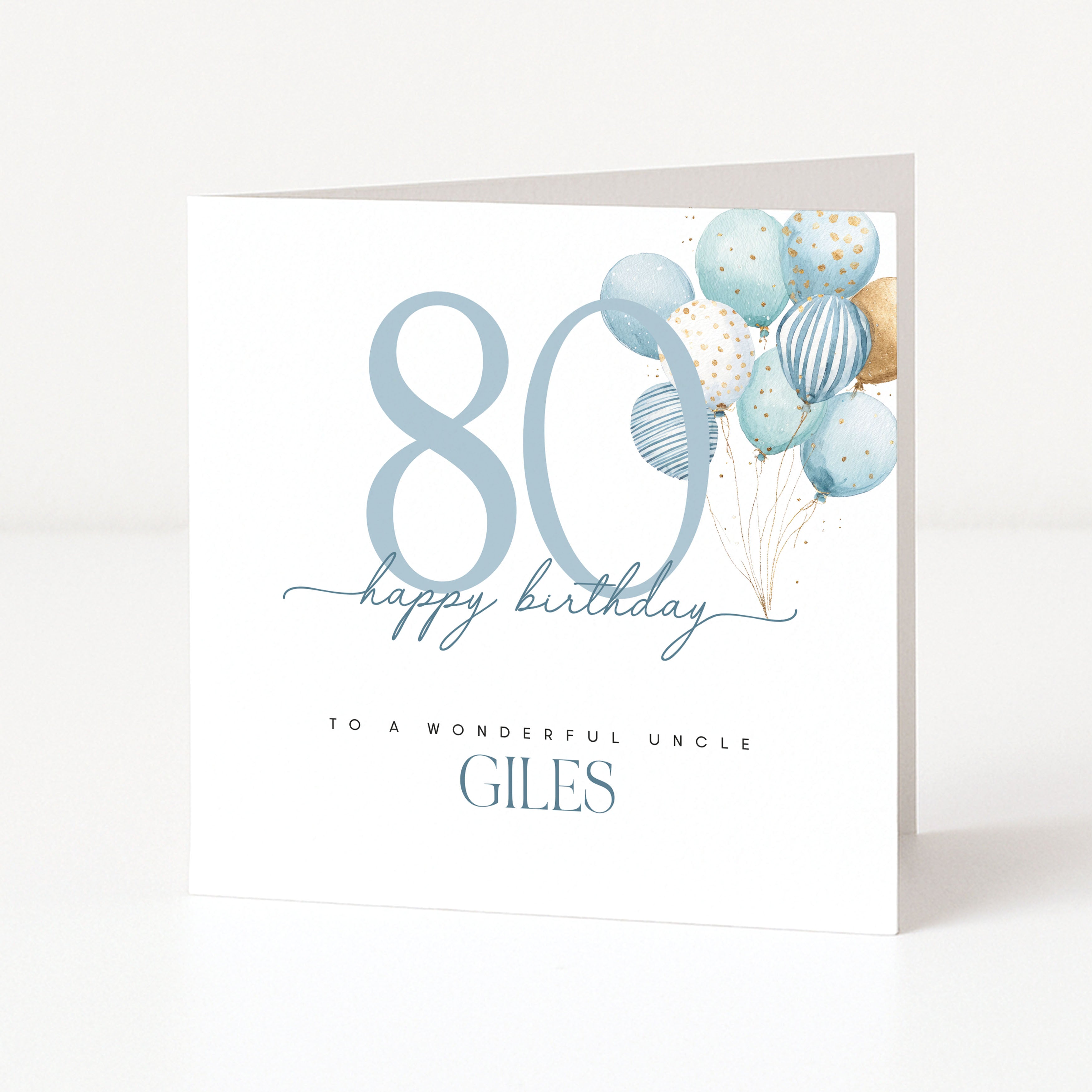 Personalised uncle 80th birthday card for Giles with a large blue 80 and blue watercolour balloons.