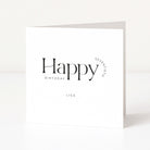 White birthday card with 'Happy Seventieth Birthday Lisa' text on a white background