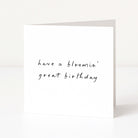 White card with black text 'have a bloomin' great birthday' on a white background