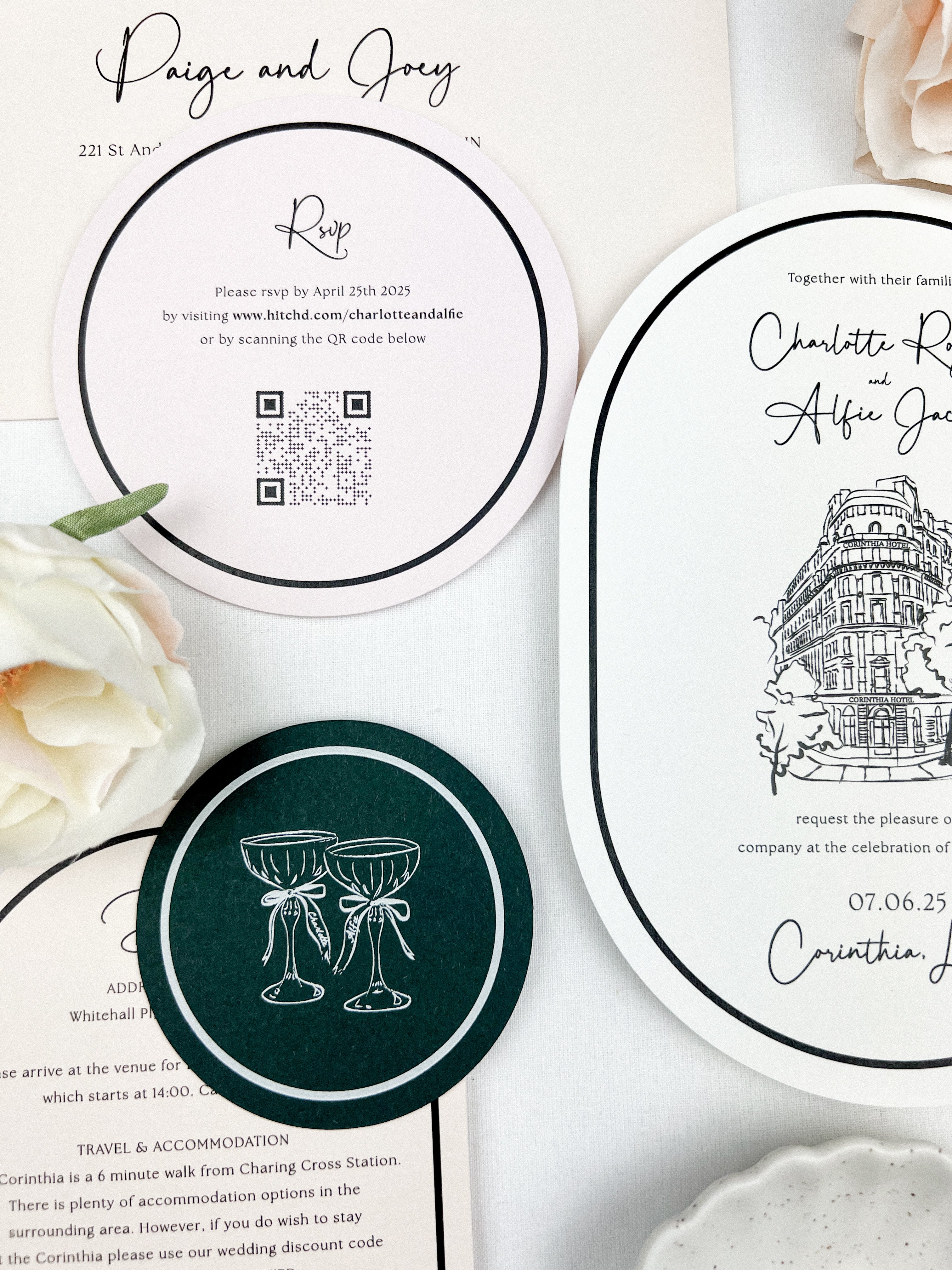 Round wedding invitation cards with various designs on a white surface.