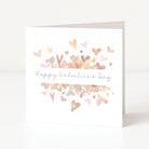 Greeting card with colorful heart shapes and 'Happy Valentine's Day' text on a white background