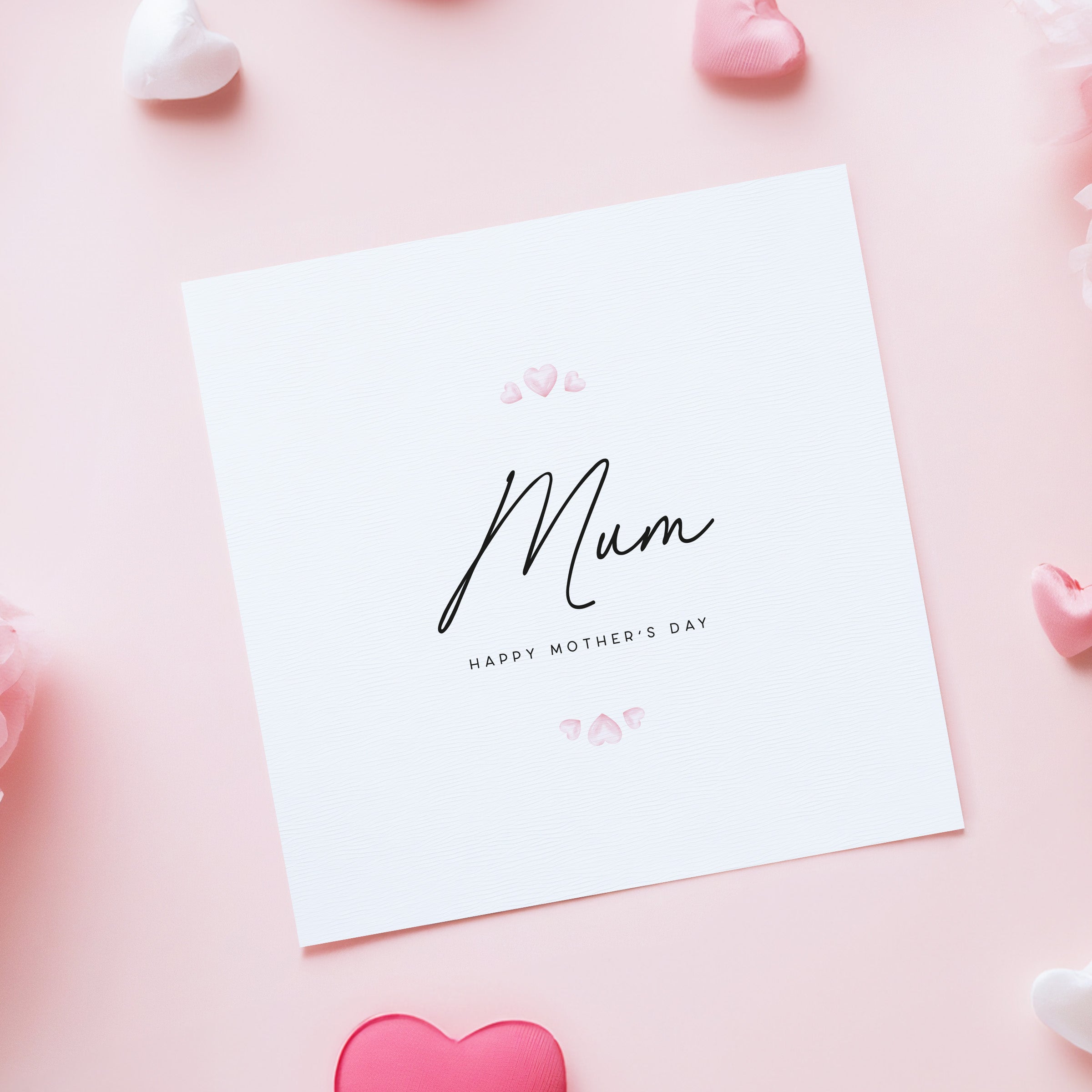Card with 'Mum' and 'Happy Mother's Day' text on a pink background