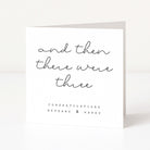 Greeting card with 'and then there were three' text on a white background
