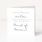 Greeting card with text asking if a sister will be the maid of honor on a wedding day.