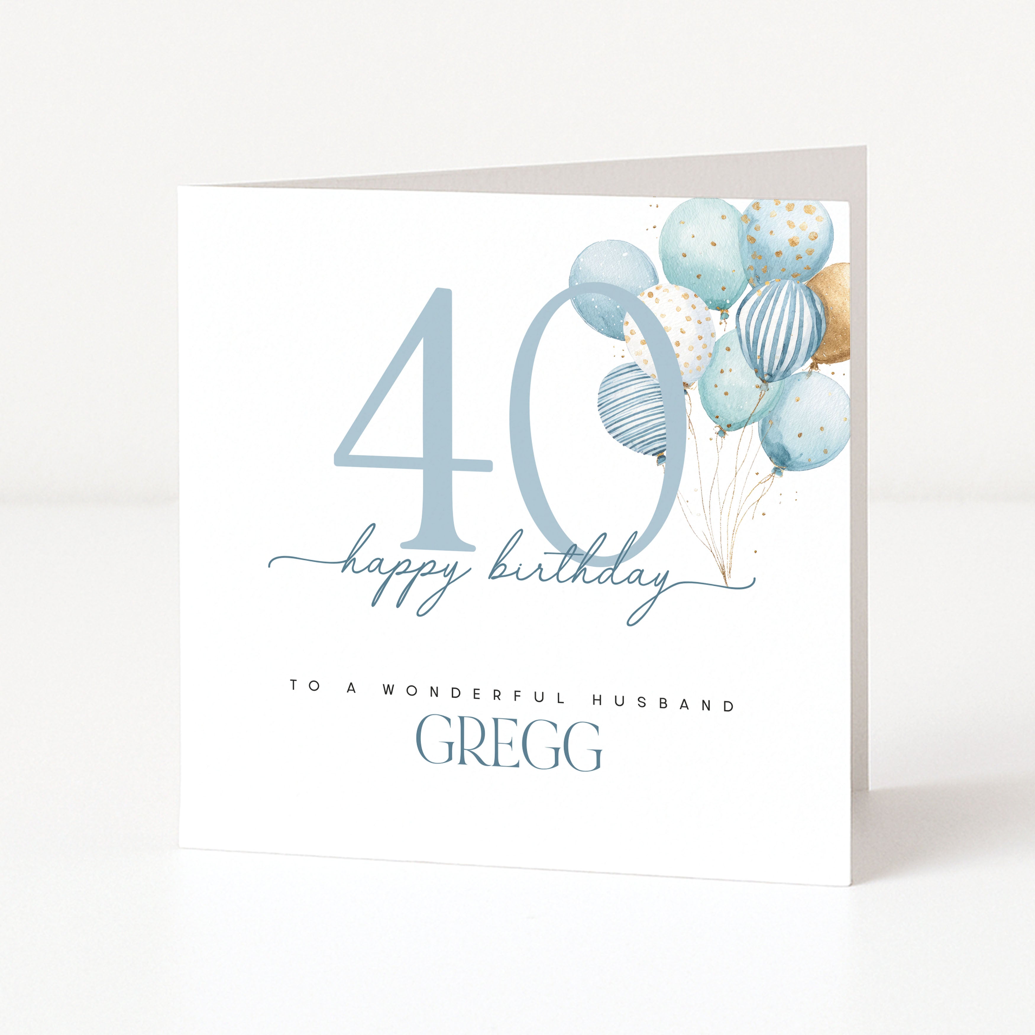 Personalised square 40th birthday card for a husband featuring a large blue line-art number forty, floating blue watercolour balloons, and customisable front name text.