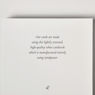 White card with text on a light gray background